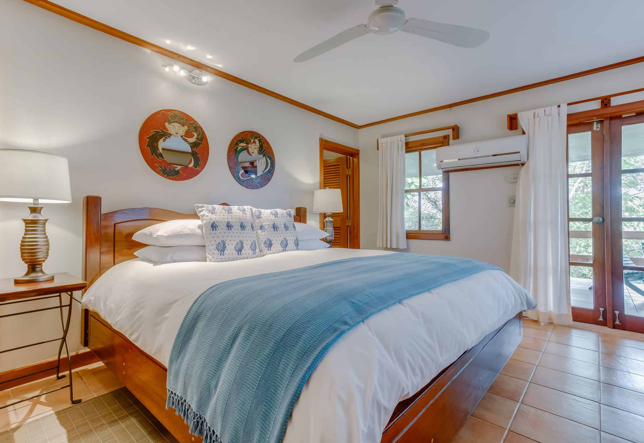 chaa creek accommodations spa villa master bedroom interior