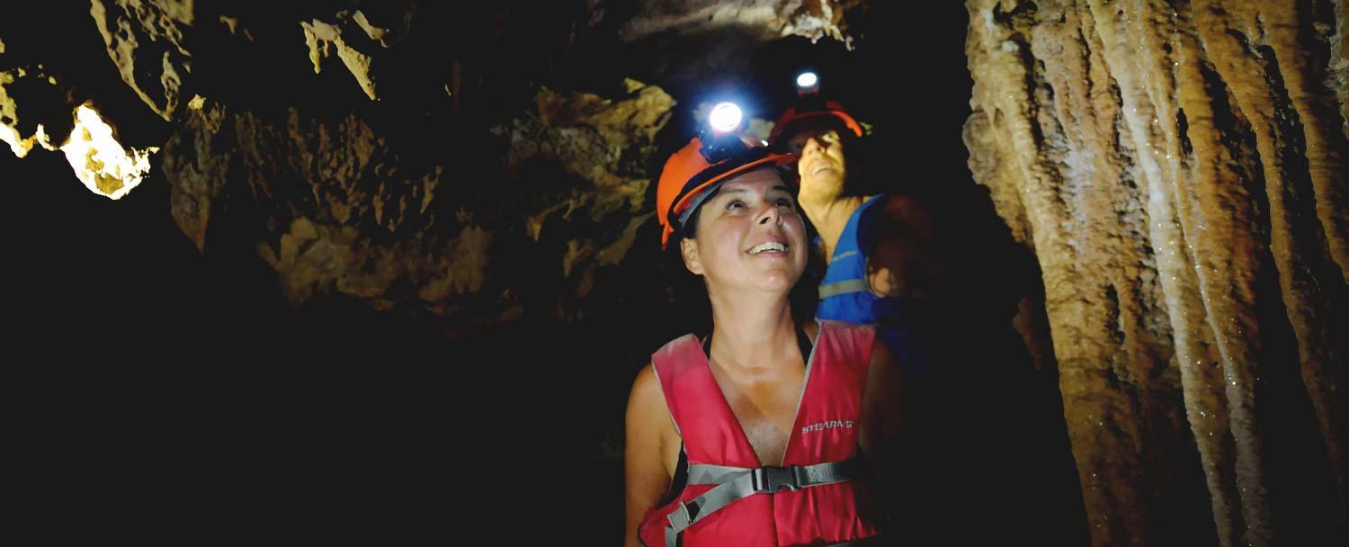 exploring caves branch river tubing tour