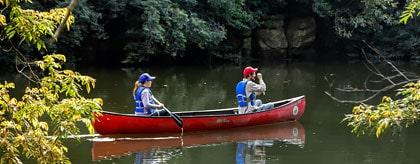 Belize Canoe Tours macal river couple paddling